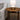Cordless bedside lamp with ivory ceramic body and fabric shade