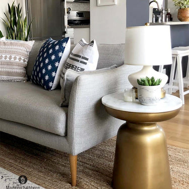 Portable ceramic table lamp with brass base and warm LED lighting