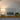 Rechargeable ceramic lamp with brass base and linen drum shade