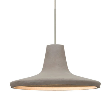 Modern concrete pendant light hanging above kitchen island with Tan shade