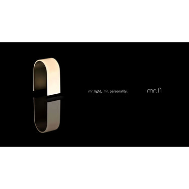 Warm light arch-shaped LED lamp for bedside tables by Koncept