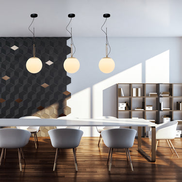 Artemide Nh 22 ceiling pendant light with handcrafted glass globe and elegant metal detailing