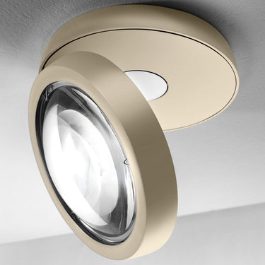 Designer Nautilus LED ceiling fixture by Lodes with adjustable 2200K–2700K dim-to-warm lighting