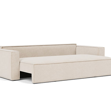 Newilla sofa bed opened into a spacious guest bed with beige Adario Basmati fabric