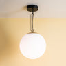 Modern NH 35 ceiling light by Artemide with blown glass diffuser and brass accent for home or commercial interiors