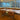 Agnoli table lamps on office desks in a modern workspace