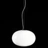 Oluce Alba 465 simple pendant light with a shiny opal blown glass sphere on a dark studio background