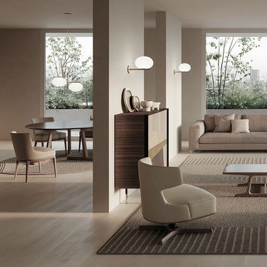 Oluce Alba 468 pendant light hanging in a wide, bright room