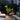 Oluce Berlin-Out table lamp on a lounge terrace in the evening