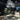 Lyndon pendant light by Oluce over a dining table, lifestyle view