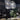 Lyndon pendant light by Oluce over a dining table, lifestyle view