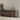 Oluce The Globe table lamp on a sideboard against a light wall
