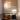 Oluce Zanuso 275 table lamp in white with a large opal diffuser on a curved support
