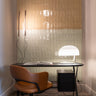 Oluce Zanuso 275 table lamp in white with a large opal diffuser on a curved support