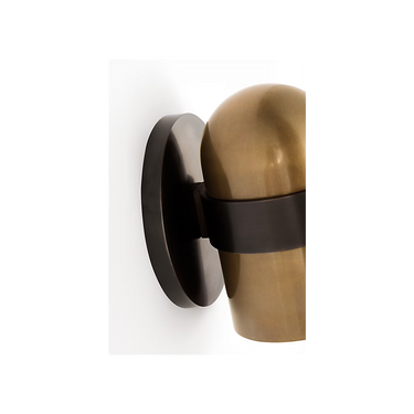 Brass wall sconce with integrated LED and crystal center detail