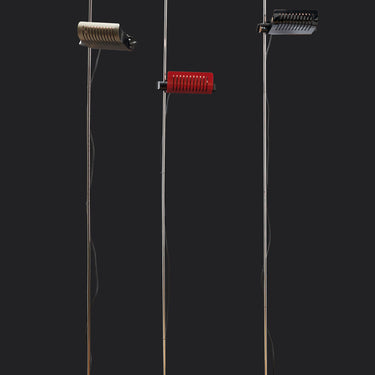 Red Colombo floor lamp by Oluce with sleek metal finish for modern interior decoration