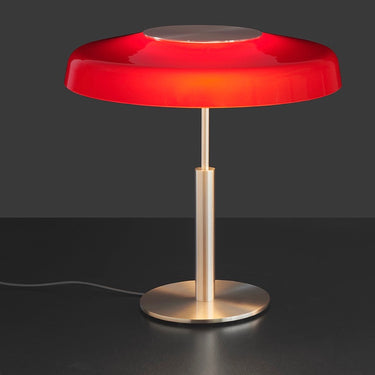 Oluce Dora table lamp in satin gold with red glass shade