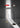 Oluce Dora floor lamp with red glass shade, lit