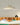 Pantaya Pendant by Pablo – 39 in Sand over a table