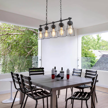 Matte black linear island chandelier with adjustable hanging chain for home kitchen and dining room.