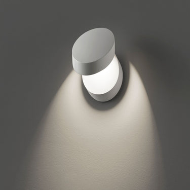 Lodes Pin-Up compact wall sconce with 90-degree tilt and 355-degree rotation