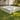 White Play Pad square resort bed on a lawn