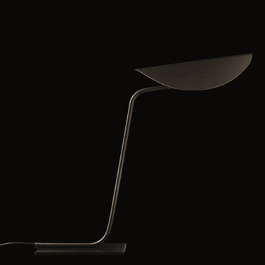 Modern indirect lighting table lamp by Oluce designed by Christophe Pillet