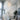 ET2 Quartz crystal pendants cascading down a stairwell above a glass dining table