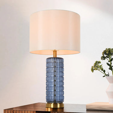 Modern Blue Table Lamp with Gold Accent and Fabric Shade
