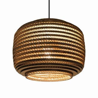Handmade Ausi 12 pendant lamp with warm diffused light.

