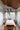 Cluster of Roest steel pendants over a dining table, Graypants lifestyle photo