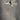 ET2 Rollo tube pendant against a mottled gray concrete wall, seen from below