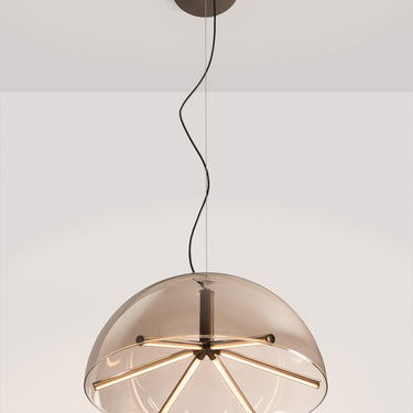 Penta Runa pendant light on, still life showing the glass arms