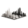 Stainless Steel New York vs San Francisco architecture chess pieces by Skyline Chess on the black & white hatch board
