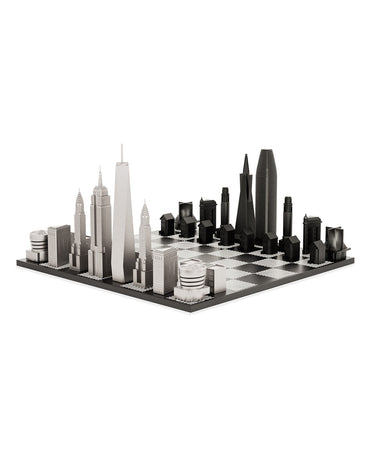 Stainless Steel New York vs San Francisco architecture chess pieces by Skyline Chess on the black & white hatch board