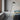 Astep VV Cinquanta Floor Lamp, switched on beside a chair