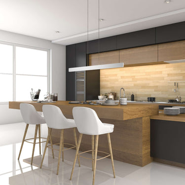 Energy-efficient Koncept Sub 48 LED linear pendant with dimmable lighting for dining room.