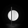 Oluce Superluna table lamp in black with a glowing rotating hemisphere on a black stem