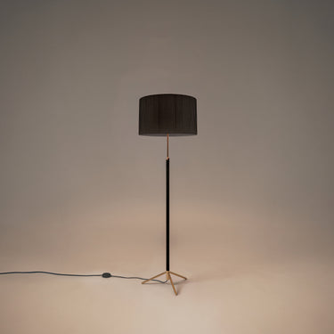 Santa & Cole Pie de Salon G2 adjustable designer floor lamp with polished brass finish and black ribbon shade