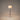 Santa & Cole Pie de Salon G2 designer floor lamp with polished brass finish and white linen shade