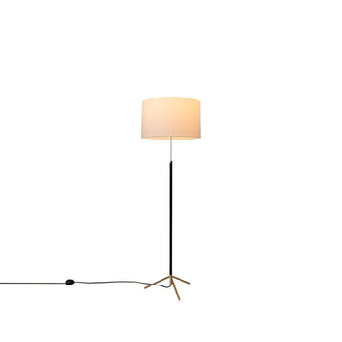 Contemporary Pie de Salon G2 floor lamp providing warm ambient lighting in bedroom with white linen shade