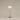 Santa & Cole Diana floor lamp with white parchment shade in a modern living room