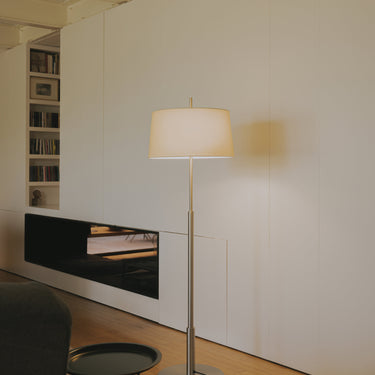 Diana floor lamp by Santa & Cole featuring a satin nickel metal frame