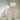 Santa & Cole Diana floor lamp illuminating a sophisticated lounge
