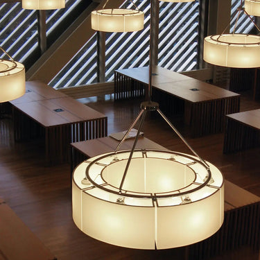 Chrome pendant chandelier with twelve white shades by Santa & Cole