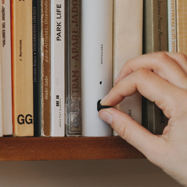 Bib Luz book-shaped LED shelf lamp by Oscar Tusquets