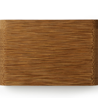 ADA compliant Graypants Skew cardboard sconce providing warm lighting in modern commercial hallway.