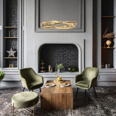 Brass LED Chandelier Illuminating Living Room 