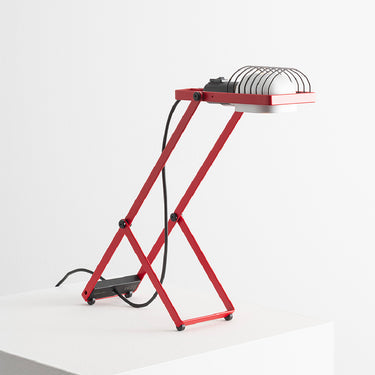 Red Sintesi table lamp by Artemide with adjustable metal structure and direct task lighting, Italian design desk lamp for home office or bedroom
