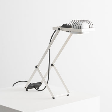 White Sintesi table lamp by Artemide with adjustable metal structure and direct task lighting, Italian design desk lamp for home office or bedroom